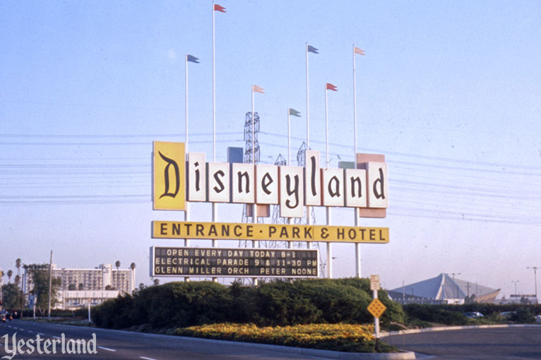 An old photo of the Disneyland entrance sign.